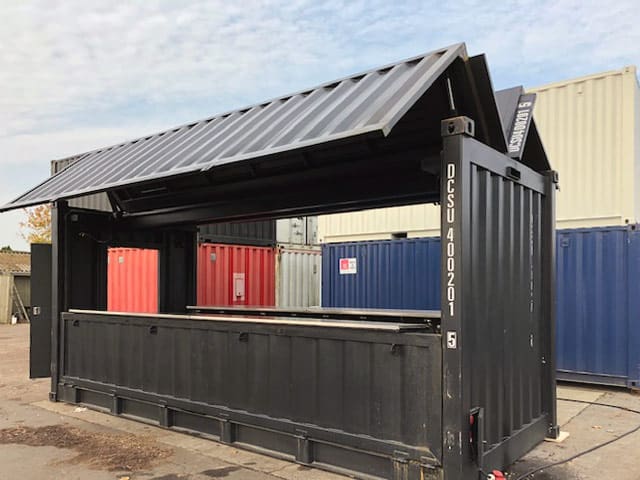 Containeri 20 fodsi tuniniaavik/imerniartarfik pallunngaviusartalik hydraulik (imerpalasut naqitsinerat) atorlugu ammartartoq.